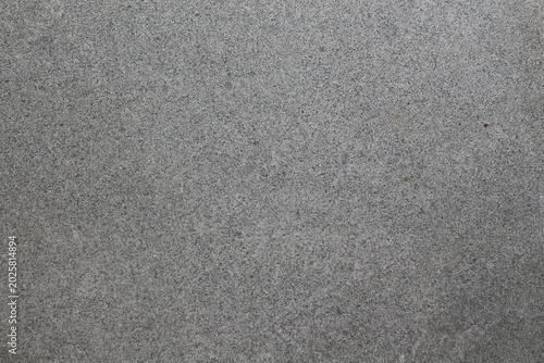 Foto Close-up texture of speckled gray granite stone surface with fine grain
