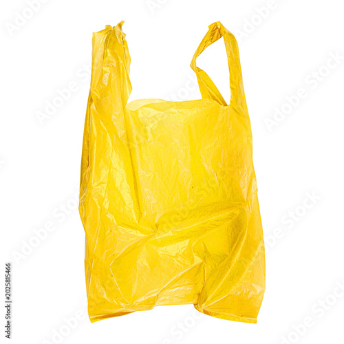 Obraz na plátně Yellow plastic shopping bag isolated on white background with clipping path