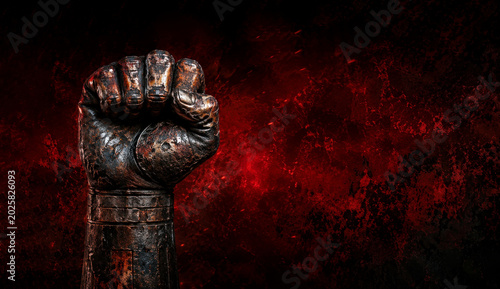 Powerful rusty iron fist emerging dramatically from dark red grunge background