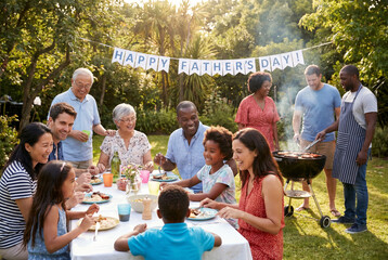 Multi-generational family from diverse backgrounds celebrating Father's Day with