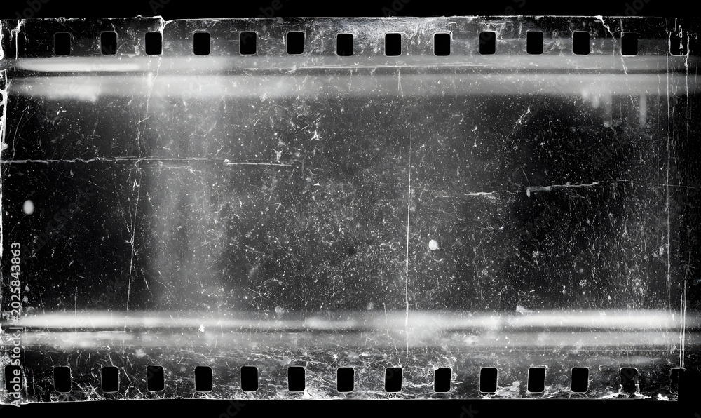 Fototapeta premium An old film texture that has scratches, noise, and light leaks. A realistic transparent overlay of the film texture in black-white, dust, and grain, creating a negative effect of cinema nostalgia.
