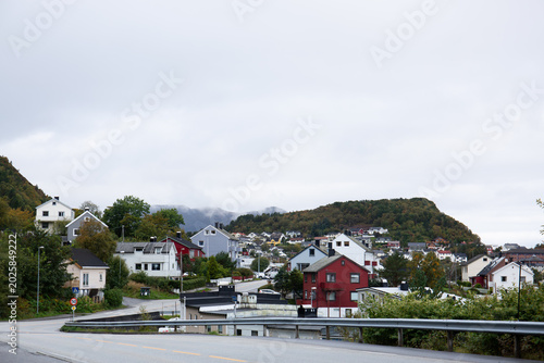 A Scandinavian town among the mountains in gloomy rainy weather