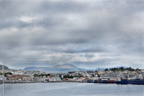 Panoramic view of the city on the shore on a cloudy day