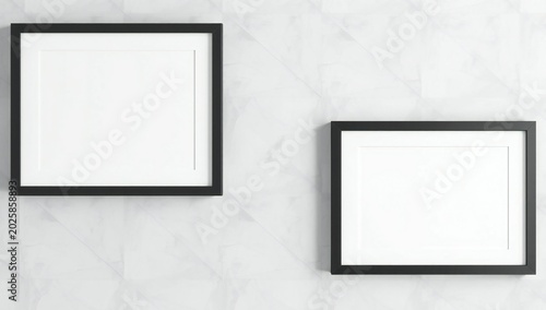 Two empty black frames displayed on a clean white marble background for professional presentation