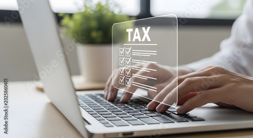 Tax filing concept with laptop and digital interface showing checkmarks and tax text