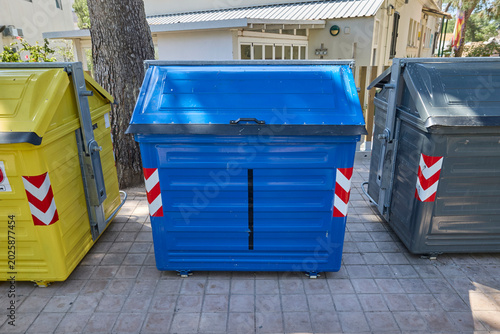 Fotografi Large recycling containers for waste sorting in urban area