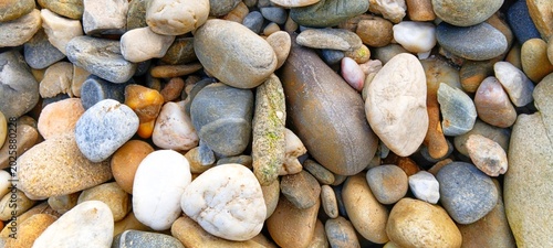 Canvastavla Full frame composition of rounded river pebbles