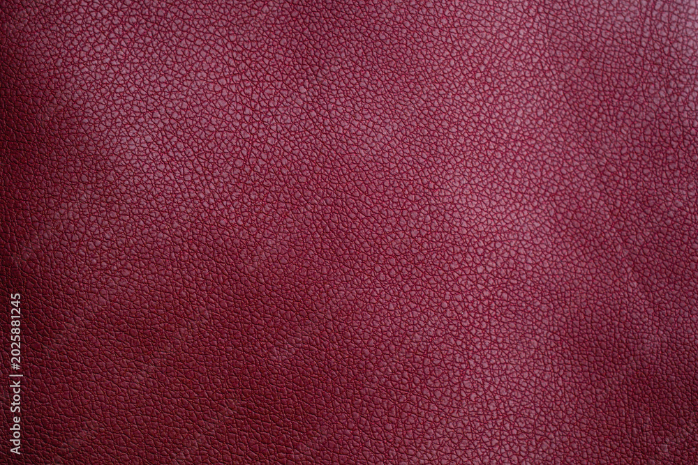 Fototapeta premium Deep red leather texture background close up