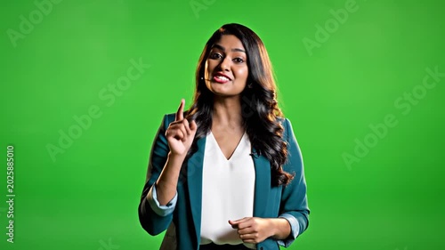 Woman Speaking and Gesturing Against Green Screen Background