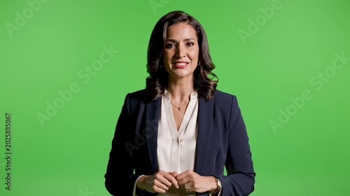 Woman Speaking and Gesturing in Front of Green Screen