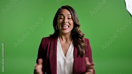Woman Speaking and Gesturing in Front of Green Screen