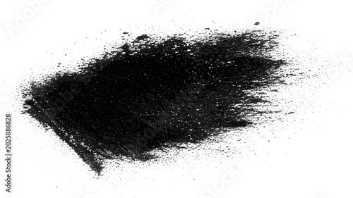 Black charcoal powder splash on white background, dark carbon dust texture, messy graphite powder explosion for artistic design and makeup concepts