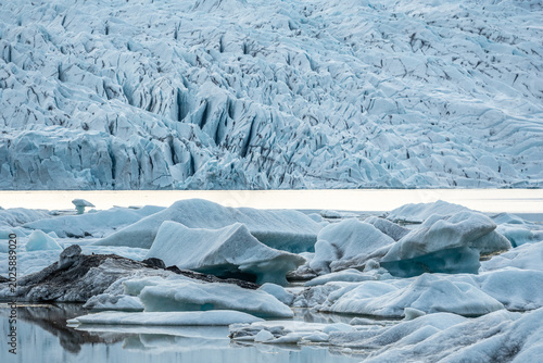 Glacier lagoon with icebergs floating at the foot of the Vatnajokull Glacier or Vatna Glacier, the largest and most voluminous ice cap in Iceland, and the second largest in area in Europe