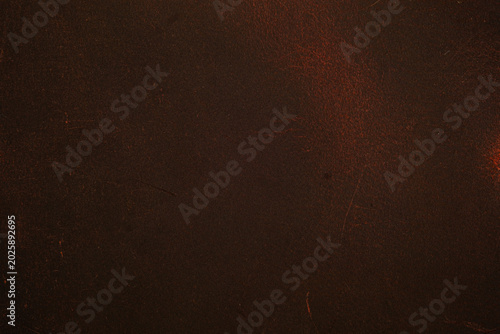 Fényképezés Close up of dark brown leather surface with subtle scratches and texture for bac