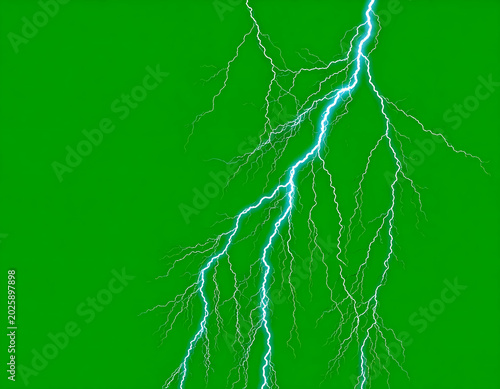 Powerful lightning bolt strike isolated on green background.