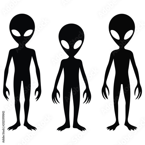 Three black alien silhouettes standing