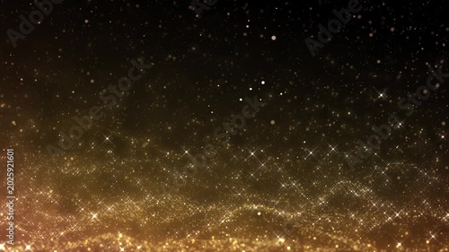 Golden glitter particles dust powder shining stars abstract background