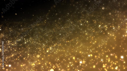 Golden glitter particles dust powder shining stars abstract background