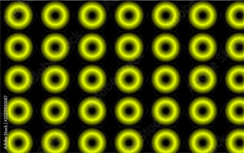 Glowing Green Circular Patterns in Grid Formation on Dark Background