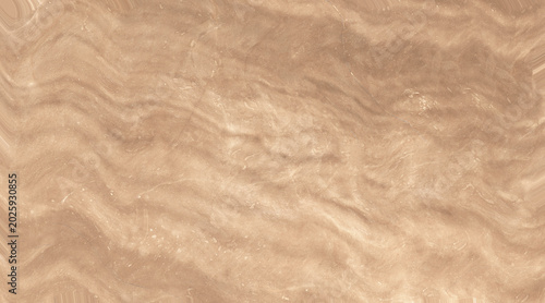 Photography A close-up abstract view of flowing brown and cream marble texture with a natura