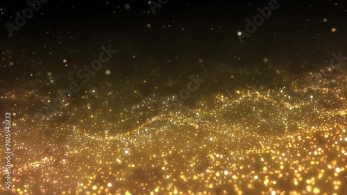 Golden glitter particles dust powder shining stars abstract background