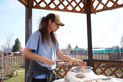 Photography Woman Skewering Shashlik, Organizing Skewers In Bowl Before Grilling, Gazebo Set