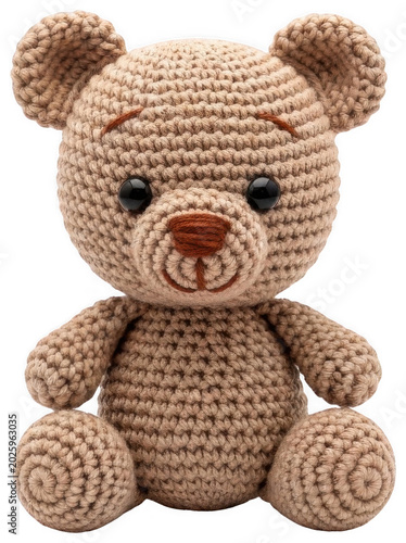 Adorable beige brown crocheted teddy bear toy sitting calmly, illuminated by soft isolated transparent background image