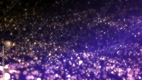 Golden glitter particles dust powder shining stars abstract blue background