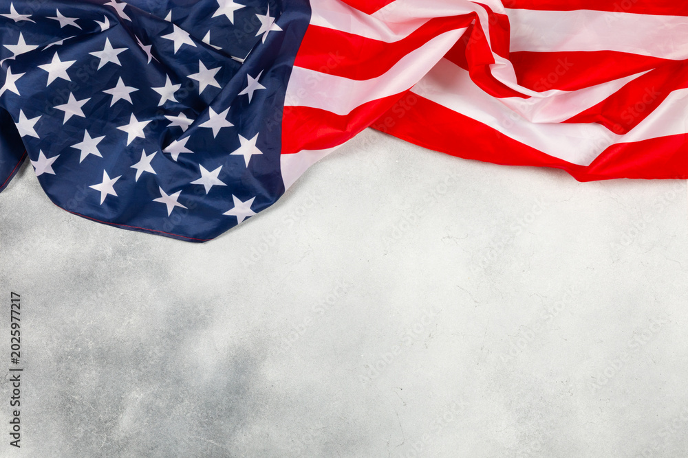 Obraz premium American flag on textured background. Memorial day, Independence Day and Veterans Day. American patriotism concept. Day of Remembrance and Honorary Banner. 4th of July celebration. Top view, space 