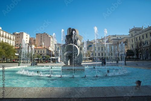 Modern sculpture and fountain in Syntagma Square Athens Greece