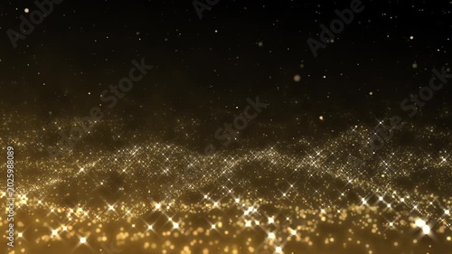 Golden glitter particles dust powder shining stars abstract background