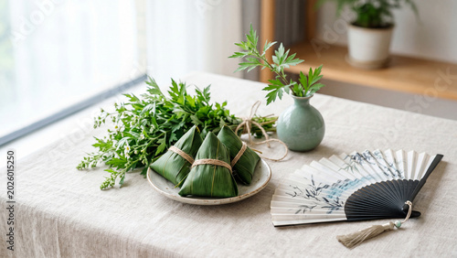 Zongzi sticky rice dumplings with mugwort leaves for Dragon Boat Festival celebration