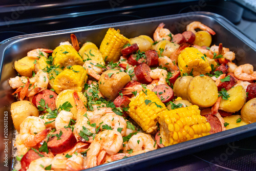 One pan dinner. Delicious shrimp boil recipe in a pan fresh from the oven.