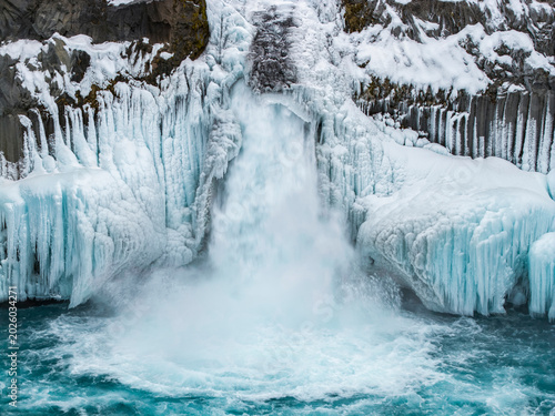Winter ice and snow at Aldeyjarfoss waterfall, Iceland