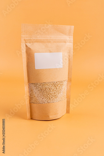 Stand-up kraft pouch with flax seed and blank label