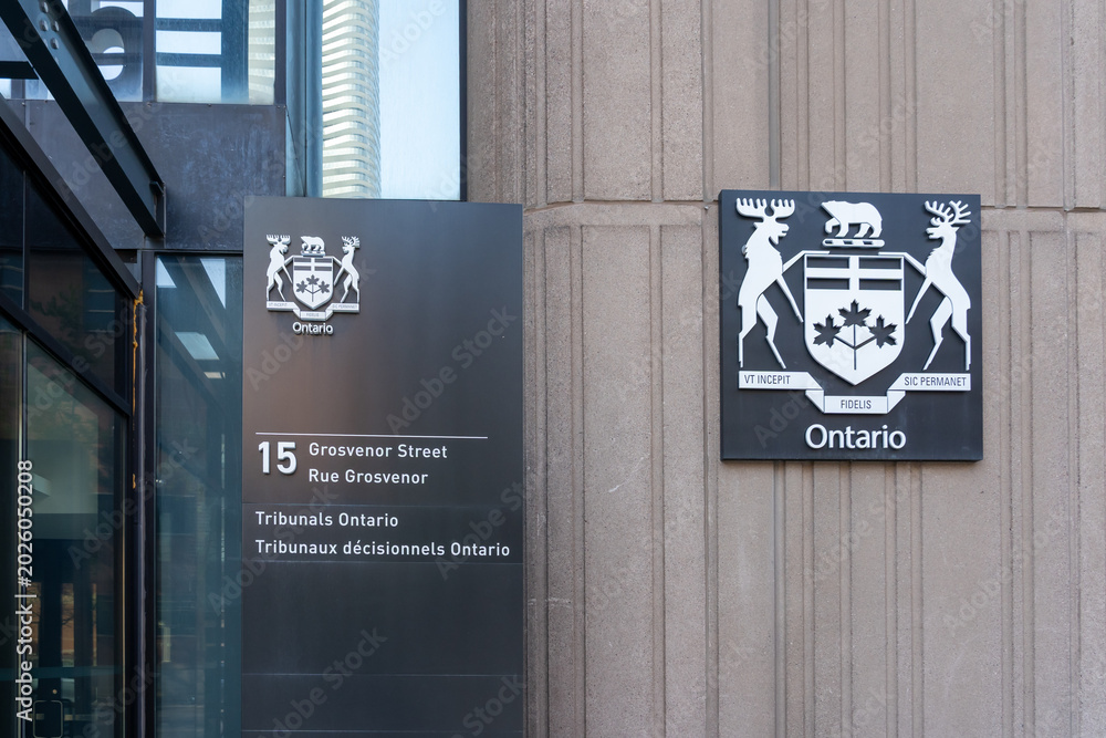 Fototapeta premium Toronto, Ontario, Canada - May 18, 2026: The entrance to the Landlord and Tenant Board ( LTB) on Grosvenor Street in Toronto, Canada. LTB is an independent, quasi judicial provincial tribunal that res