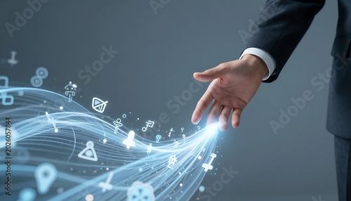 Businessman’s hand reaching toward a flowing wave of data with AI and technology symbols, highlighting data flow as key to business success.