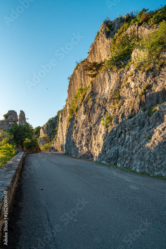 Scenic Napoleonica Hiking Trail Along Limestone Karst Cliff - Trieste Italy, Paved Path Stone Wall, Famous Climbing Bouldering Area, Golden Sunburst, Adriatic Region Outdoor