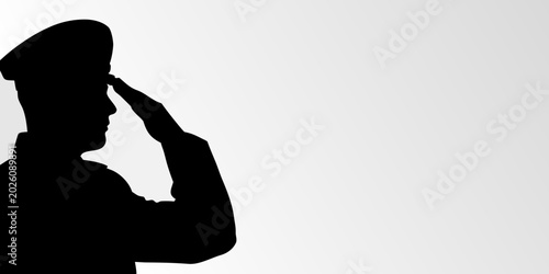 Cuadro en lienzo saluting soldier silhouette against a white background