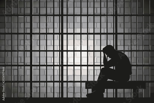 Konstfotografi prison cell silhouette with a seated figure in shadow