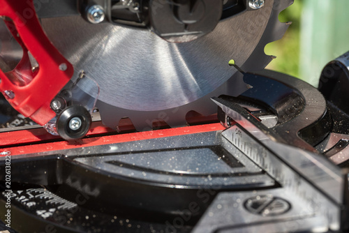 Manual miter saw in the workshop.