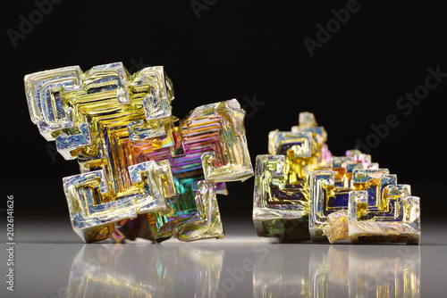 Bismuth crystals. Bismuth - chemical element with symbol Bi and atomic number 83