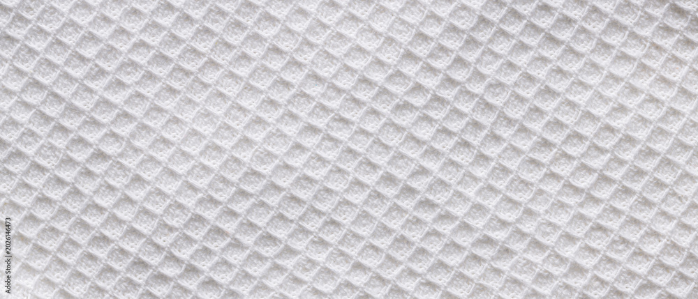 Fototapeta premium White waffle cotton fabric texture background with diamond pattern for clean soft textile backdrop