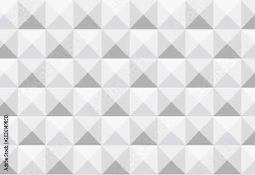 Abstract geometric pattern of repeating gray and white triangles for modern background design