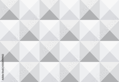 Geometric repeating rhombus pattern in light gray and white abstract background texture