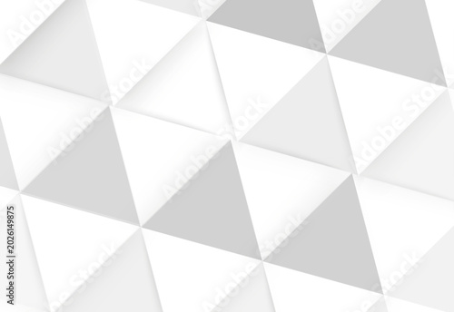 Abstract geometric 3D wall pattern with white and gray triangular facets background