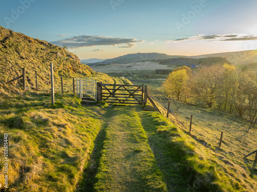 A Kissing gate and a traditional wooden gate at Penwyllt in the Brecon Beacon mountains in South Wales