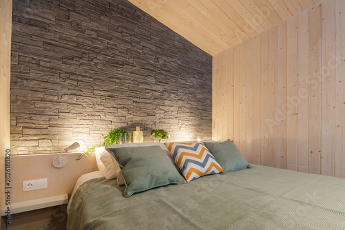 Foto Stylish bedroom interior in eco-style