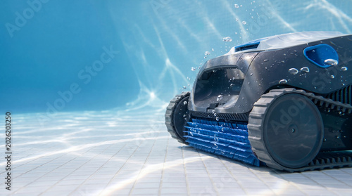 Automatic pool cleaner robot scrubbing floor under blue water. Underwater appliance for maintenance and hygiene of swimming pool. Robotic technology for efficient pool cleaning system.