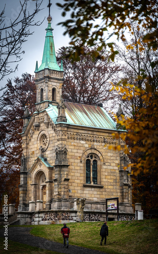 Riedel family tomb chapel in Desna Jizera Mountains Czech Republic surrounded by autumn trees